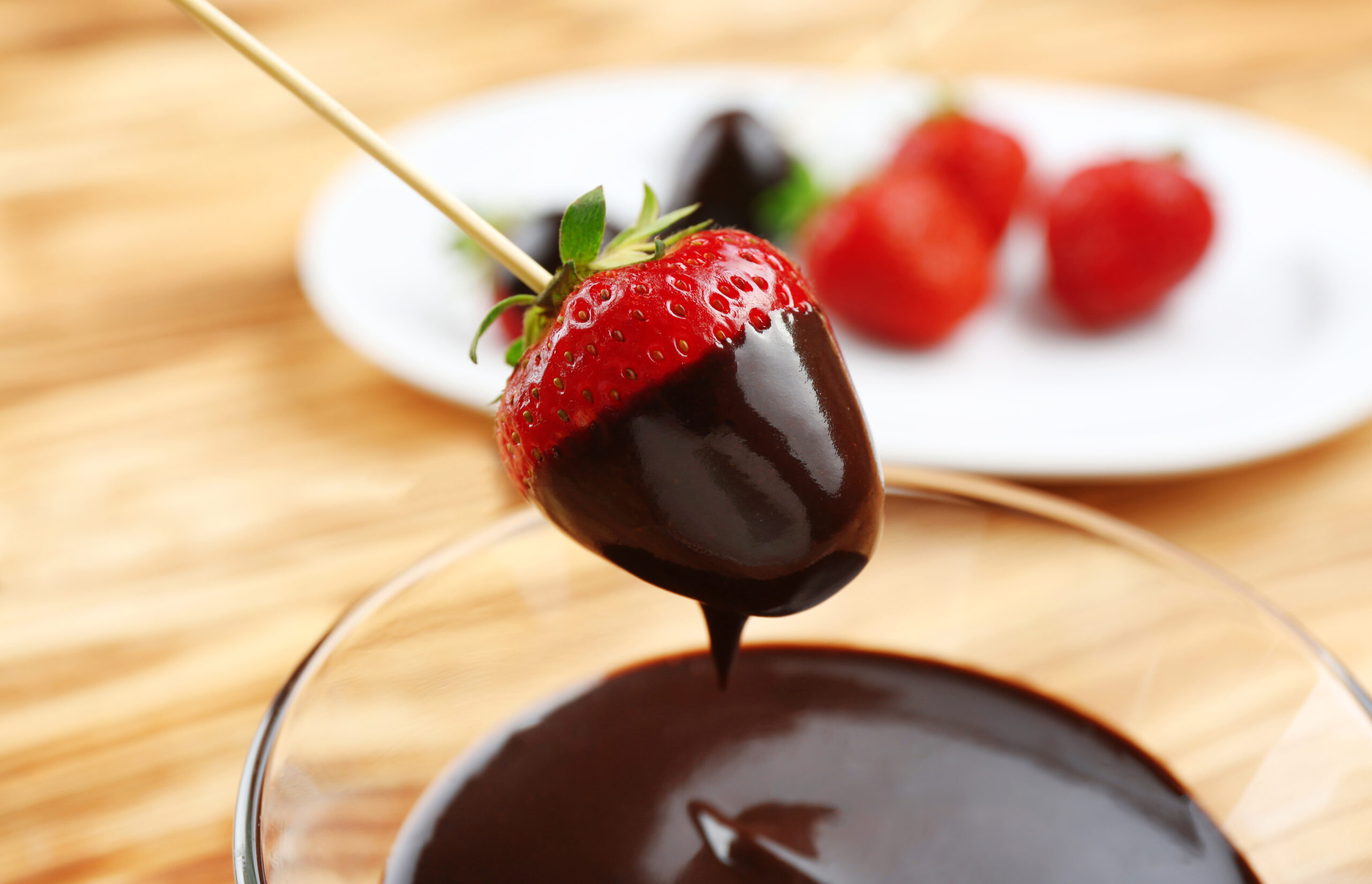 Image of a strawberry dipped in chcolate fondue
