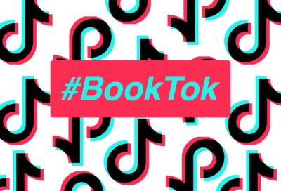 words #booktok with tiktok logo, neon pink and blue