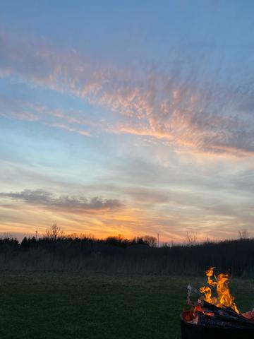 Image of campfire at sunset