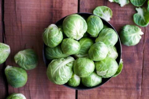 Image of a bowl of Brussels sprouts on a table
